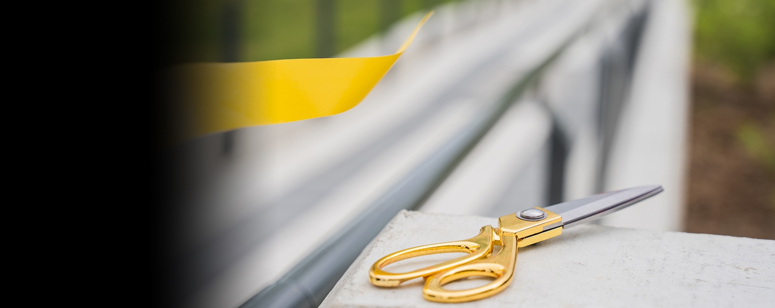 golden scissors next to ribbon