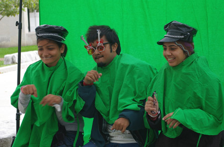 three students singing