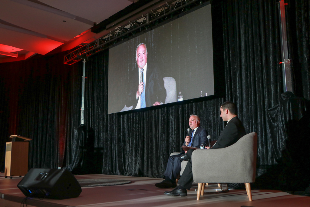 GM President and General Manager Stephen Carlisle answers questions from the audience during the Georgie-Odette Leadership Symposium on Thursday, Nov. 16. The questions were asked through the Attendify app and asked by fourth-year business student Tommaso Iacobelli.