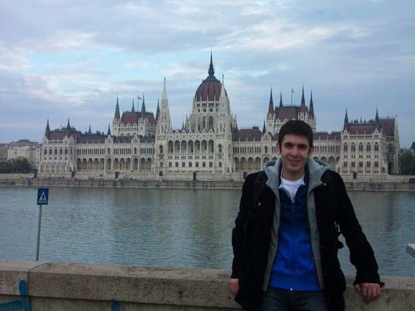 Alex in Budapest out front of the parliament building 