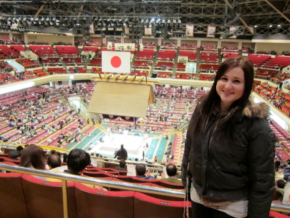 Olivia in Japan at a Sumo match