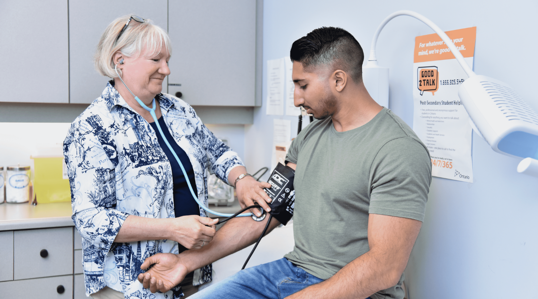 a doctor talking with a student