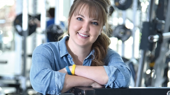 HK student Kelly Carr is shown in the University of Windsor weight room.